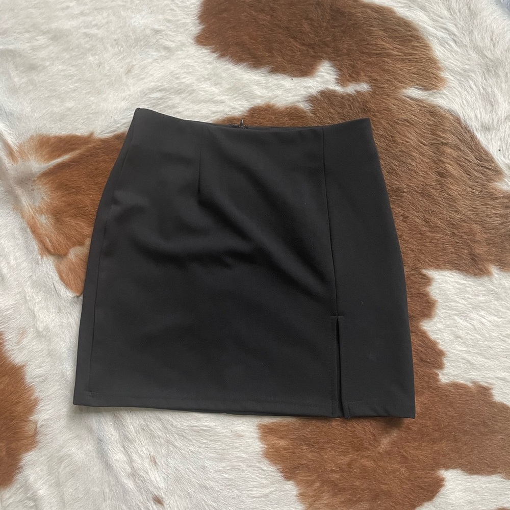 Black mini skirt with front slit
